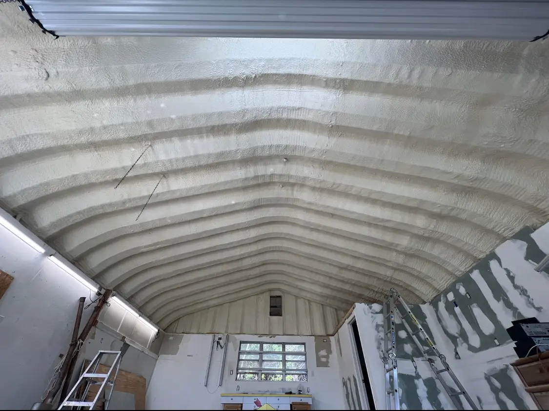 Spray polyurethane foam applied to the underside of a metal roof deck in Wilbraham
